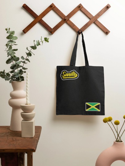 Smile Jamaica Tote BagsRE-Usable "Smile Jamaica Tote Bags  "Tote Bag for Crafts, Shopping, Groceries, Books, Beach,
Diaper Bag &amp; Much More, 15”x16”This tote bag is the perfect accessorWatchamaknJamaicanWatchaMaknJamaican